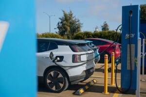 Electric vehicles charging at a RACV station in Barnawartha, VIC, Australia, promoting sustainable transportation.