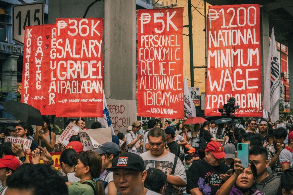 Demonstrators in Metro Manila demand higher wages and economic relief in a public protest.
