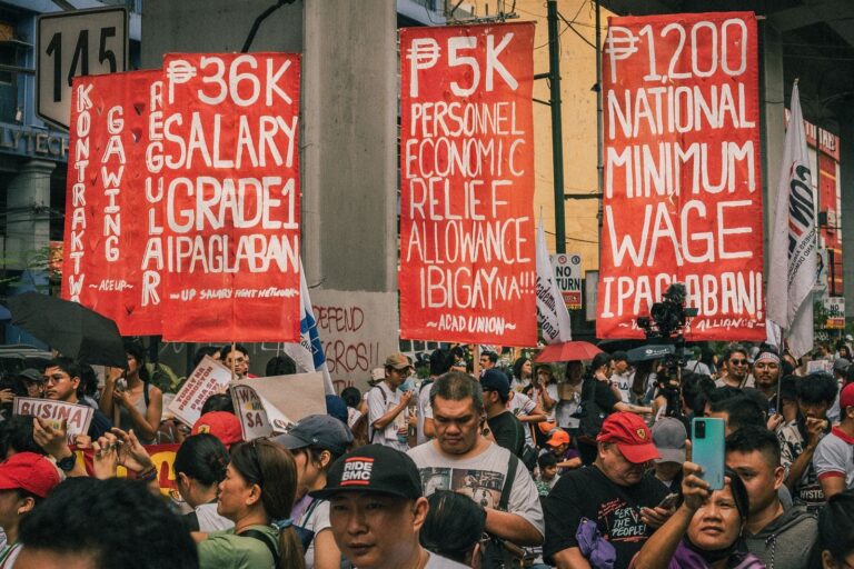 Demonstrators in Metro Manila demand higher wages and economic relief in a public protest.